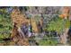 Aerial view of the property showcasing the home's landscaping and large lot at 3310 Bryan Way, Marietta, GA 30008