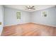 Hardwood floors accentuate the natural light and spaciousness of this bedroom at 3310 Bryan Way, Marietta, GA 30008