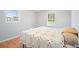 Cozy bedroom features hardwood floors and two windows with natural light at 3310 Bryan Way, Marietta, GA 30008