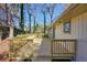 Rear wooden deck offering a view of the verdant surroundings at 3310 Bryan Way, Marietta, GA 30008