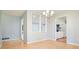 Charming dining room showcasing a modern chandelier and a view into the kitchen at 3310 Bryan Way, Marietta, GA 30008