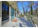 Inviting front porch with a vibrant blue door and decorative glass, offering a warm welcome at 3310 Bryan Way, Marietta, GA 30008