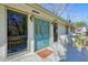 Inviting front porch with a vibrant blue door and decorative glass, offering a warm welcome at 3310 Bryan Way, Marietta, GA 30008