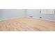 Bright living room with hardwood floors, fresh paint, and ample space for entertaining at 3310 Bryan Way, Marietta, GA 30008