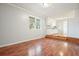 Bright living room features hardwood floors and natural light from a large window at 3310 Bryan Way, Marietta, GA 30008