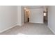 Bedroom featuring neutral paint, carpet flooring, with a doorway leading to an adjoining space at 7416 Toccoa Cir, Union City, GA 30291