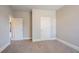 Bedroom with wall-to-wall carpeting and a double door closet at 7416 Toccoa Cir, Union City, GA 30291