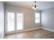 Living room with lots of natural light shining through sliding glass doors at 7416 Toccoa Cir, Union City, GA 30291