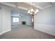 Open concept living space with fireplace and modern ceiling fan at 7416 Toccoa Cir, Union City, GA 30291