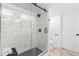 The glass enclosed walk-in shower features marble tile and modern fixtures, creating a spa-like atmosphere at 199 14Th Ne St # 2312, Atlanta, GA 30309