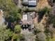 Aerial view of a well-maintained home featuring a unique roof design, lush greenery, and a private courtyard at 3330 Habersham Rd, Atlanta, GA 30305