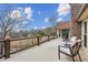 Spacious deck with outdoor seating, wood railing, and views of the surrounding landscape at 8 Colonial Club Se Dr, Acworth, GA 30102