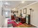 Office area with custom shelving, stylish desk and chair, and warm lighting at 8 Colonial Club Se Dr, Acworth, GA 30102