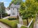 Charming two-story home with manicured landscaping and inviting walkway at 2149 Whittier Nw Pl, Atlanta, GA 30318