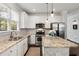 Bright kitchen featuring white cabinets, stainless steel appliances, and a granite countertop at 2149 Whittier Nw Pl, Atlanta, GA 30318