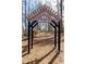 Arbor on walking path, surrounded by trees and foliage, on a path for strolls near the lake at 3338 Breton Ne Cir, Brookhaven, GA 30319