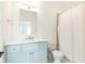 Cozy bathroom with light blue cabinets, white walls, and marble countertop at 3338 Breton Ne Cir, Brookhaven, GA 30319