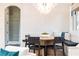 Cozy dining area with banquette seating, a round table, and decorative lighting for intimate meals at 3338 Breton Ne Cir, Brookhaven, GA 30319