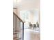 Bright dining area with large windows, hardwood floors, and modern decor, filled with natural light at 3338 Breton Ne Cir, Brookhaven, GA 30319
