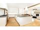 Bright kitchen featuring a large island, modern appliances, and plenty of counter space for cooking at 3338 Breton Ne Cir, Brookhaven, GA 30319