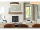 Bright and airy living room featuring a fireplace and comfortable seating for relaxation and entertainment at 3338 Breton Ne Cir, Brookhaven, GA 30319