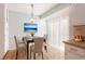 Cozy breakfast nook featuring modern chandelier and glass sliding doors at 3485 Sheree Trl, Stone Mountain, GA 30087