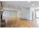 Open living room featuring hardwood floors, recessed lighting, and a stone fireplace at 3485 Sheree Trl, Stone Mountain, GA 30087