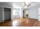 Spacious main bedroom with hardwood flooring, large closets, and bright natural light at 3485 Sheree Trl, Stone Mountain, GA 30087