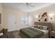 Inviting main bedroom with soft lighting, neutral colors, and tile flooring at 955 Juniper Ne St # 4125, Atlanta, GA 30309
