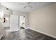 Bedroom featuring tile flooring, neutral walls, and doorway to an adjacent bathroom at 955 Juniper Ne St # 4125, Atlanta, GA 30309