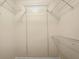 Walk-in closet featuring white wire shelving for maximum storage space at 955 Juniper Ne St # 4125, Atlanta, GA 30309