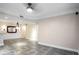 Bright living room with neutral color palette, tile floors, recessed lighting, and decorative mirror at 955 Juniper Ne St # 4125, Atlanta, GA 30309