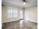 Neutral living room with large window providing natural light and neutral wall colors at 955 Juniper Ne St # 4125, Atlanta, GA 30309