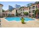 Beautiful pool area with lounge chairs and umbrellas, perfect for relaxation and recreation at 955 Juniper Ne St # 4125, Atlanta, GA 30309