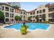 Stunning pool surrounded by lush landscaping and charming architecture in a luxurious community at 955 Juniper Ne St # 4125, Atlanta, GA 30309