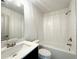 Stylish bathroom featuring modern fixtures, white subway tile in the shower, and a sleek vanity at 254 Lotus Ln, Covington, GA 30016