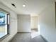 Bright walk-in closet featuring neutral paint, gray carpet, and practical wire shelving at 254 Lotus Ln, Covington, GA 30016