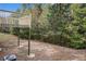 Backyard showing an elevated deck looking out into the trees at 2725 Palmview Sw Ct, Atlanta, GA 30331