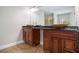 Bathroom featuring double sinks with wood cabinets and a glass-enclosed shower at 2725 Palmview Sw Ct, Atlanta, GA 30331