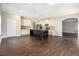 Spacious kitchen with dark wood floors, light cabinets, and a large island at 2725 Palmview Sw Ct, Atlanta, GA 30331