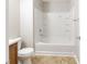 Bathroom featuring a bathtub, toilet, and tile floors at 3127 Leyland Ct, Decatur, GA 30034