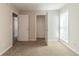 Bedroom with a window and access to a closet, neutral walls, and carpet at 3127 Leyland Ct, Decatur, GA 30034