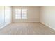 Bedroom with neutral walls, carpet, and a large window at 3127 Leyland Ct, Decatur, GA 30034