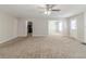 Bright living room with open floor plan, neutral colors, and access to other living spaces at 3127 Leyland Ct, Decatur, GA 30034