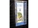 Open window view from a newly renovated bathroom featuring black marble-look tile at 589 Auburn Ne Ave # F, Atlanta, GA 30312