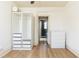 Bedroom closet space leading to bathroom with tile and shower at 589 Auburn Ne Ave # F, Atlanta, GA 30312