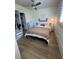 Cozy bedroom showcasing a bed, wardrobe, and integrated laundry unit at 589 Auburn Ne Ave # F, Atlanta, GA 30312