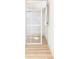 Bright room with new hardwood floors and a sunlit window with white trim at 589 Auburn Ne Ave # F, Atlanta, GA 30312