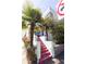 Exterior shot of home's front entrance with colorful stairs, railings, and landscaping at 589 Auburn Ne Ave # F, Atlanta, GA 30312
