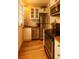 Bright kitchen featuring stainless steel appliances and wood countertops offering a cozy space for cooking at 589 Auburn Ne Ave # F, Atlanta, GA 30312